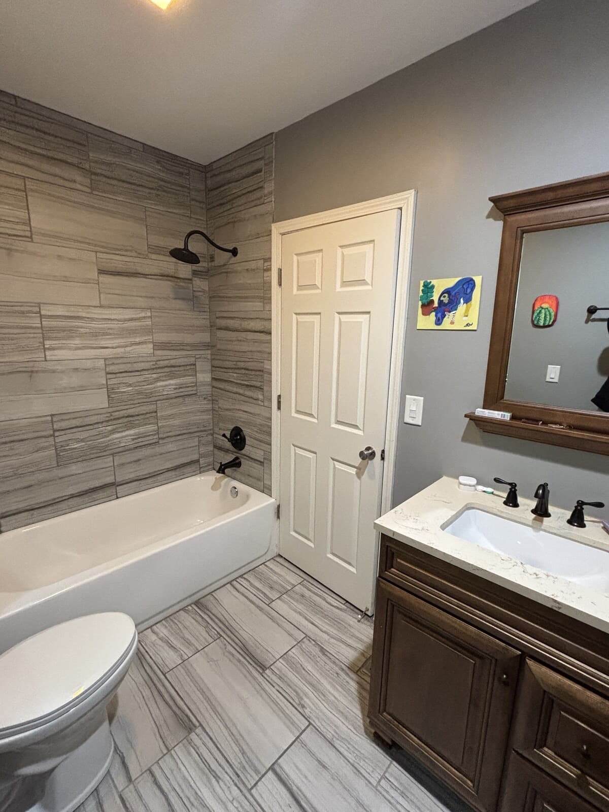 Second bathroom vanity, tile, and fixtures after turnover prep